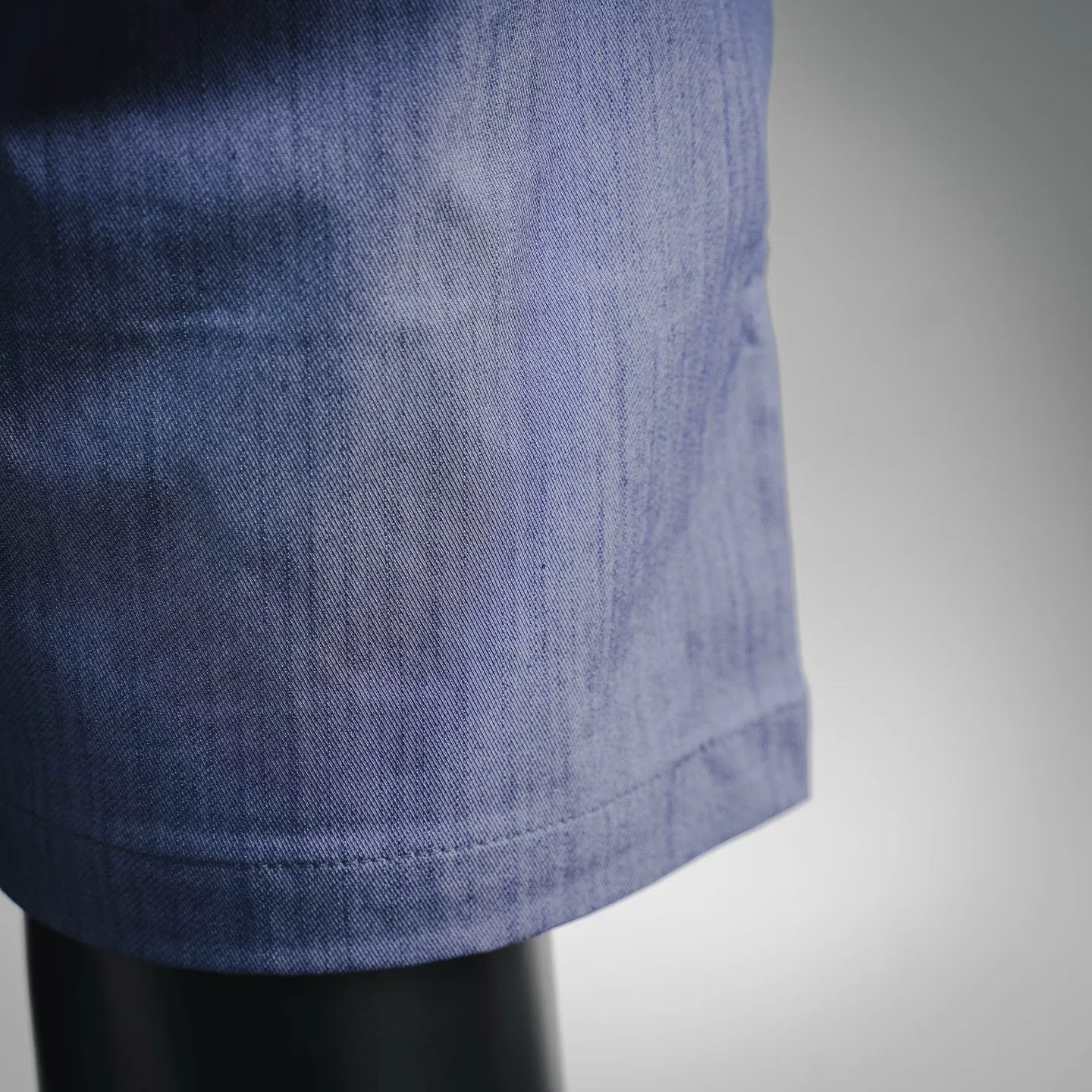 Prada blue shorts fabric panel with visible woven texture