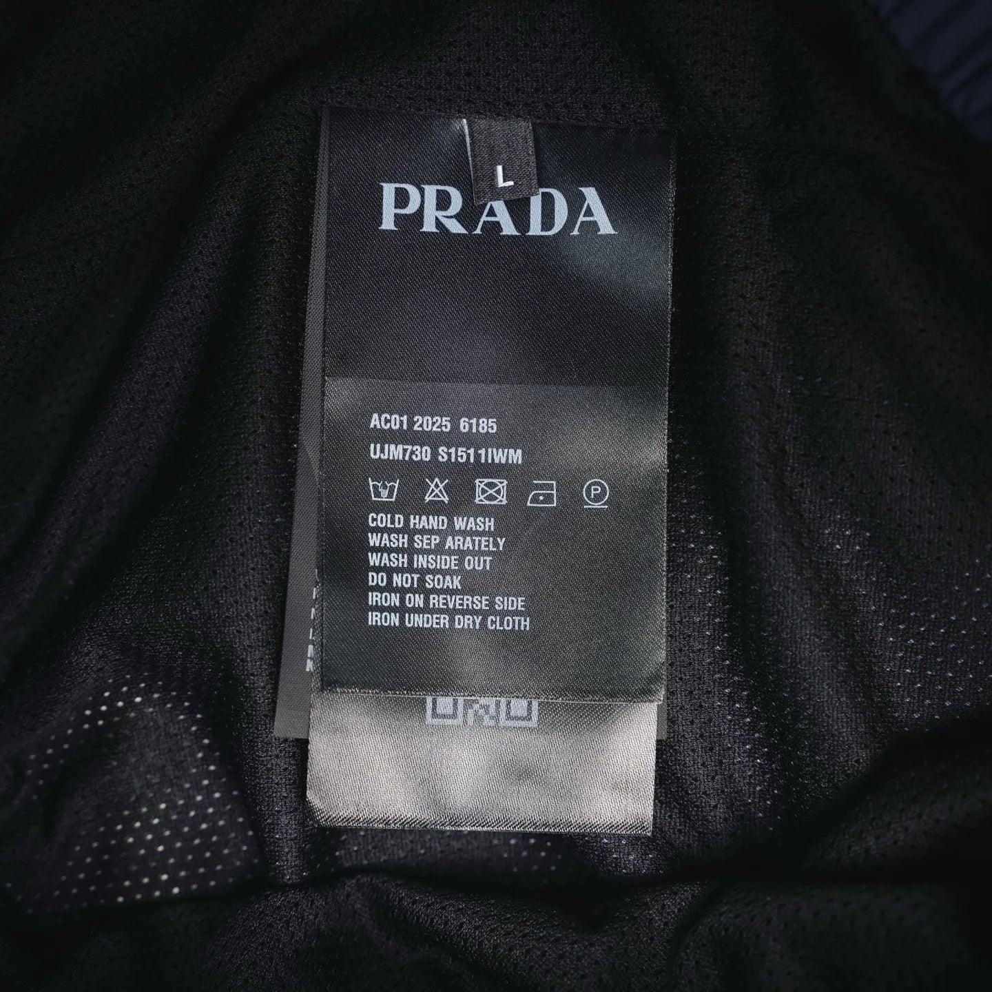 Prada size and care label on inner shorts seam
