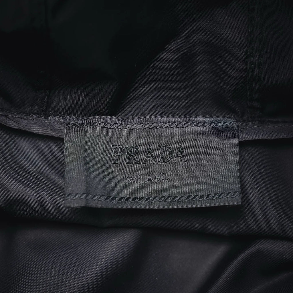 Black inner label close-up reading PRADA and MADE IN ITALY