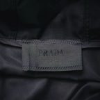 Black inner label close-up reading PRADA and MADE IN ITALY