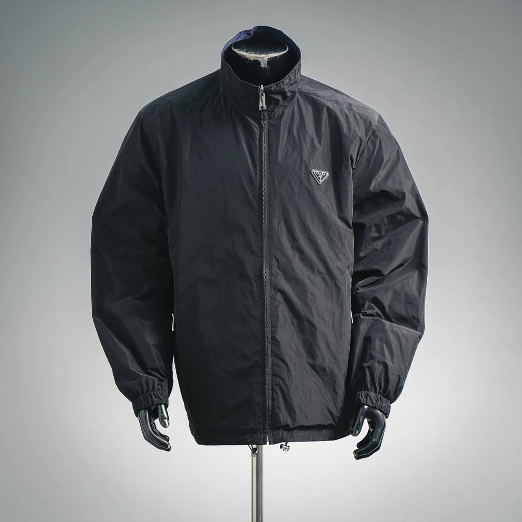 Black zip-up nylon jacket with stand collar and Prada logo patch