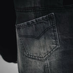Denim front pocket with stitched panel detail on black jacket