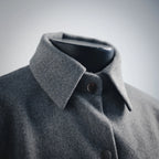 Gray wool jacket with spread collar and dark buttons