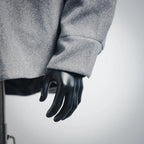 Gray wool jacket sleeve cuff with dark cuff trim