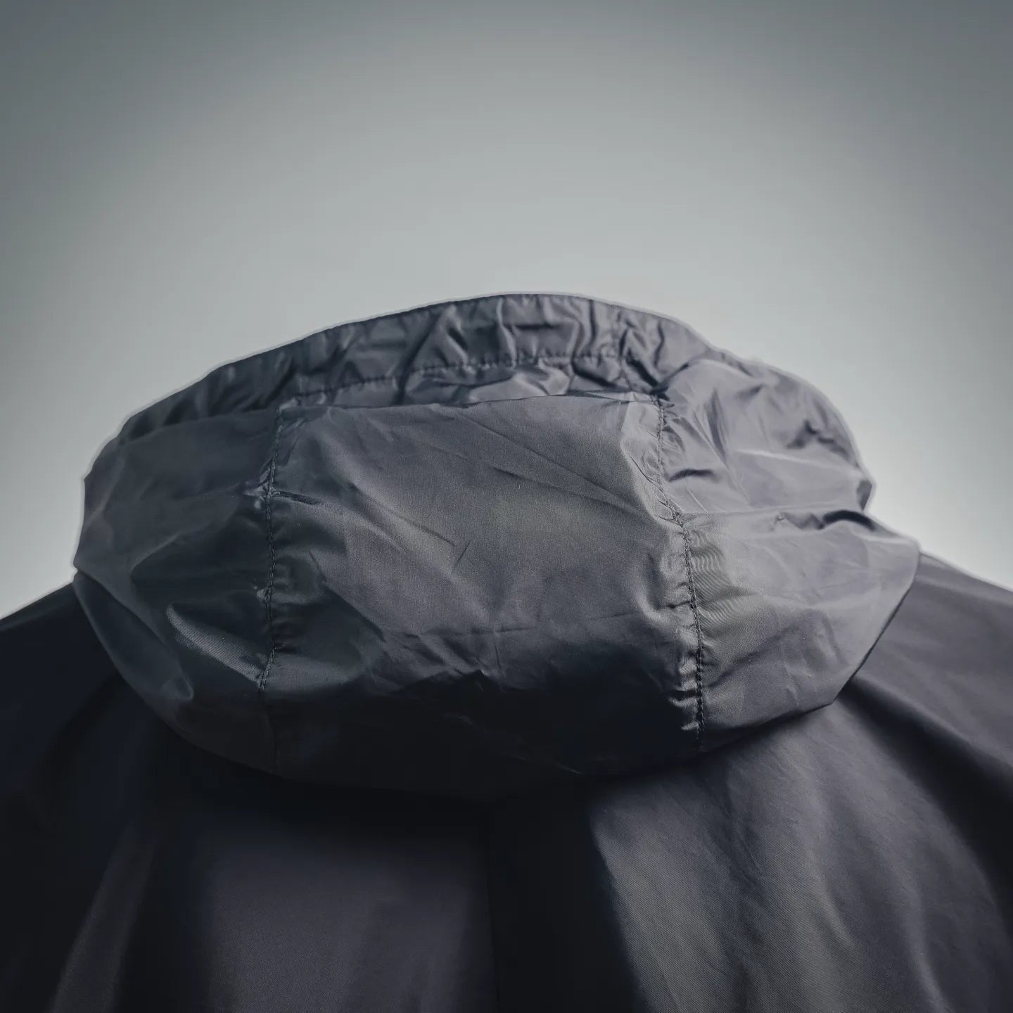 Prada hooded jacket with gathered hood and adjustable seam