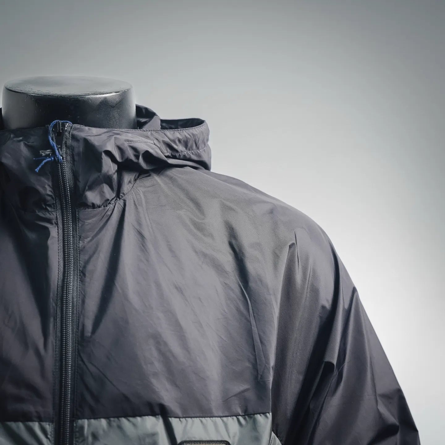 Prada black zip-front hooded jacket, high collar and shoulder seam