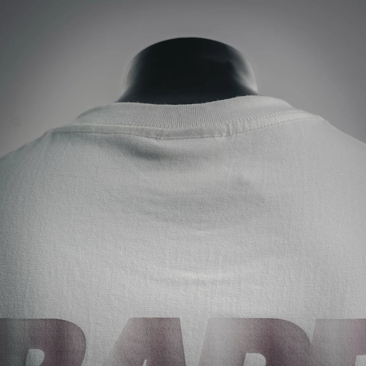 White T-shirt crew neck collar with visible back print fabric texture