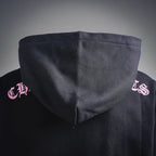 Chrome Hearts hoodie back hood area with small pink side logo prints.
