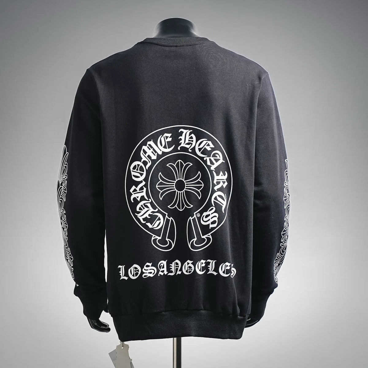 Black crewneck sweatshirt back with large circular white graphic and "Los Angeles"