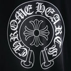 Black sweatshirt with close-up of large circular white logo graphic