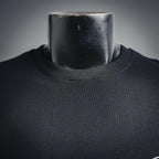 Black sweatshirt collar with ribbed crew neckline close-up