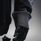 Black sweatshirt sleeve cuff with ribbed hem detail