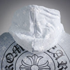 Light blue hood with allover white floral pattern, centered seam detail