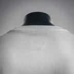White long-sleeve T-shirt back with subtle embossed graphic detail