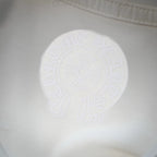 White long-sleeve T-shirt back embossed circular graphic