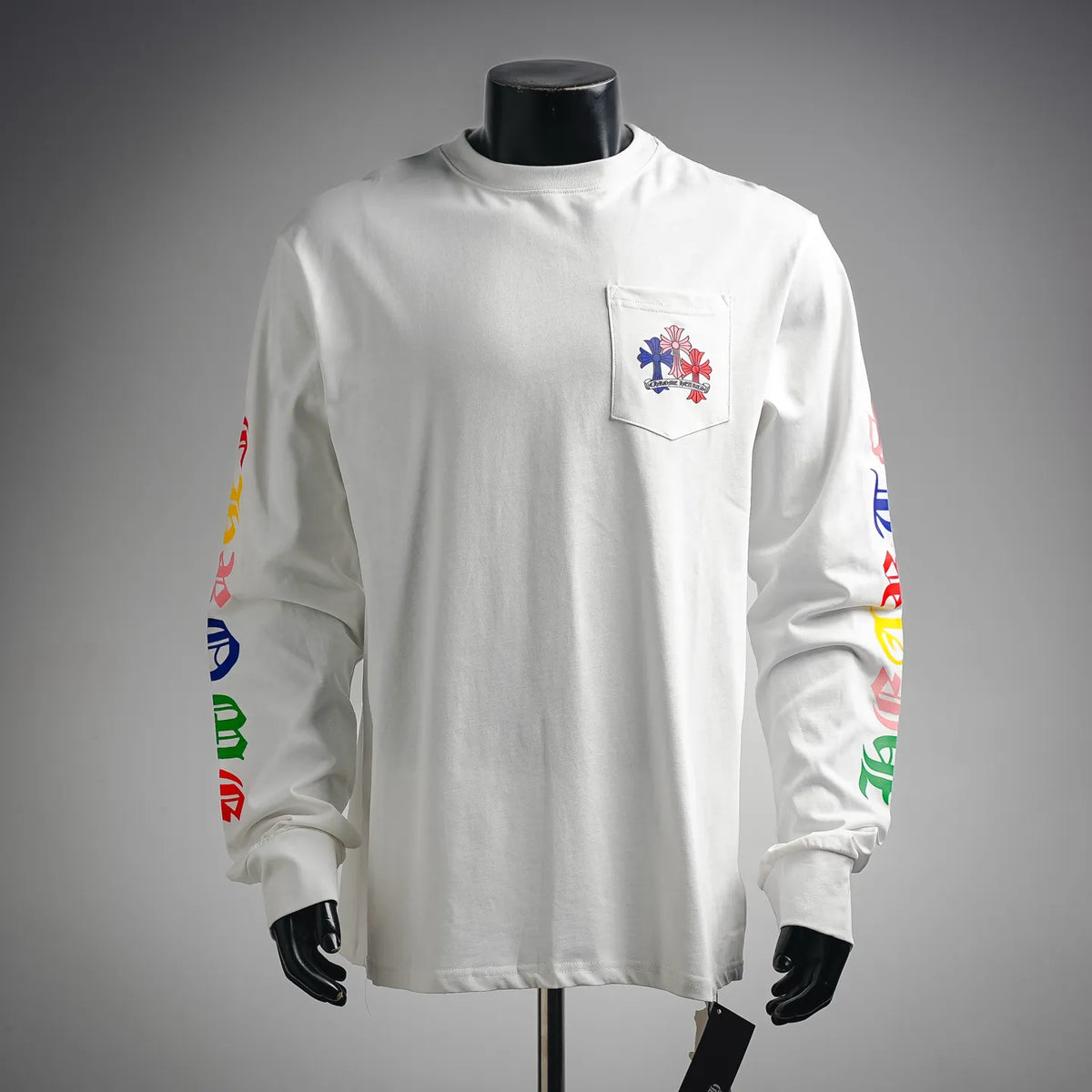 White long-sleeve T-shirt with small chest pocket graphic and crew neck