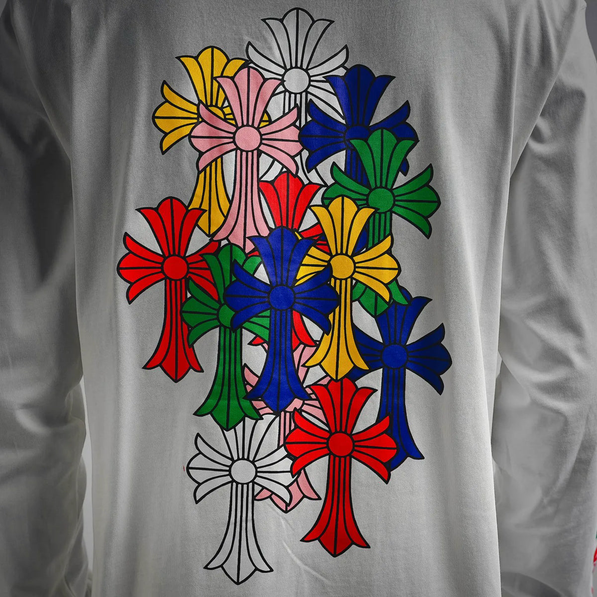Multicolor floral bouquet print on white long-sleeve T-shirt, close-up
