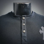 Dark henley collar with snap buttons and ribbed neckline