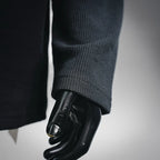 Dark long-sleeve henley sleeve with ribbed cuff