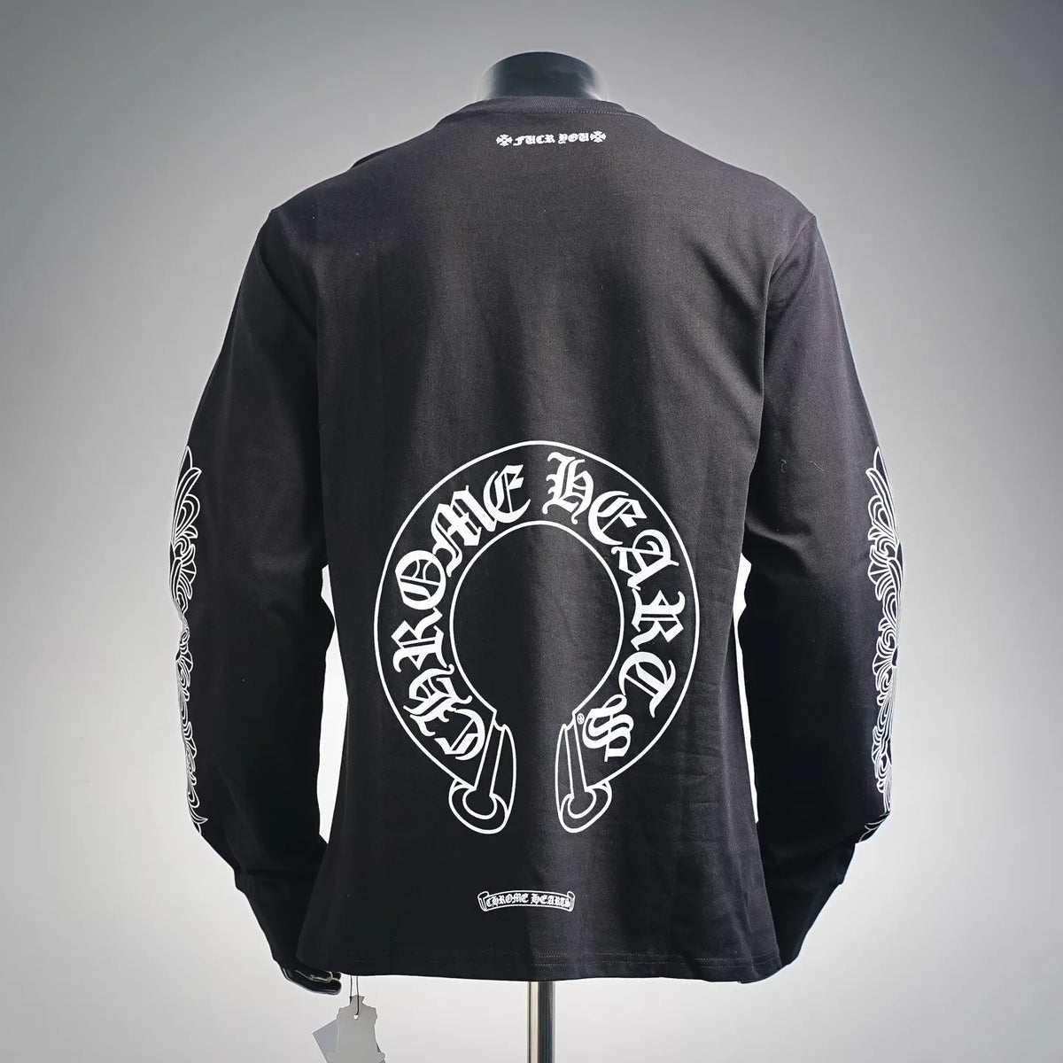 Black long-sleeve T-shirt with large back face graphic and small back neck text