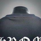 Black long-sleeve crewneck T-shirt collar and upper back seam detail