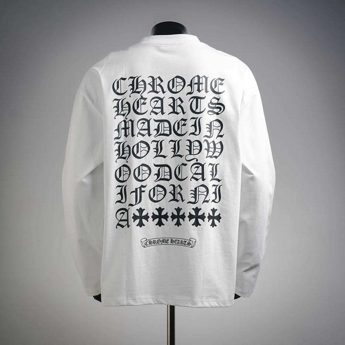 White long-sleeve T-shirt with large gothic back text and star pattern