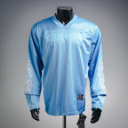 Light blue long-sleeve V-neck jersey with bold front graphic print and side detailing