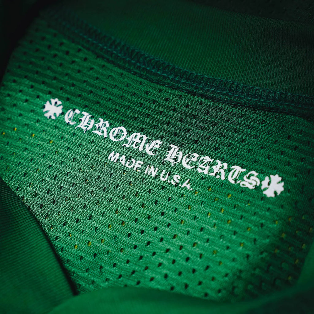 Green jersey with embroidered inside neck label including 'Made in U.S.A.'
