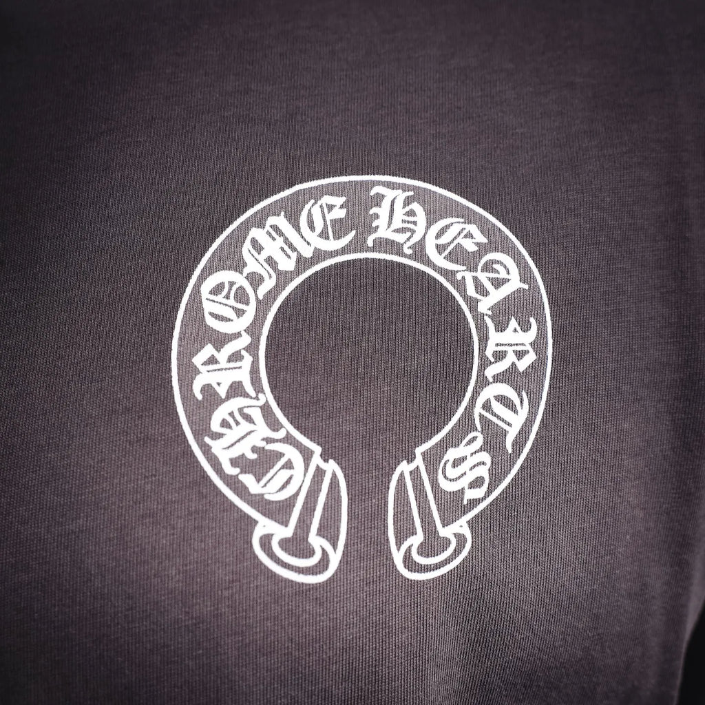Long-sleeve mock-neck shirt circular logo emblem in white on dark fabric