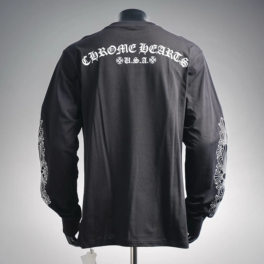 Long-sleeve dark T-shirt with large back text graphic and white sleeve emblem