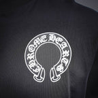 Dark long-sleeve T-shirt front with white circular logo emblem