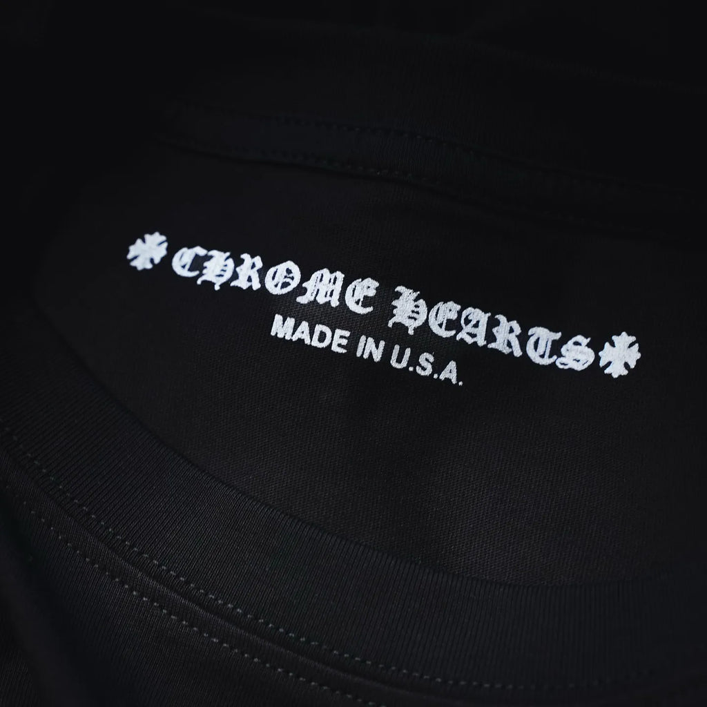 Dark long-sleeve T-shirt neckline print reading "CHROME HEARTS" and "MADE IN U.S.A."