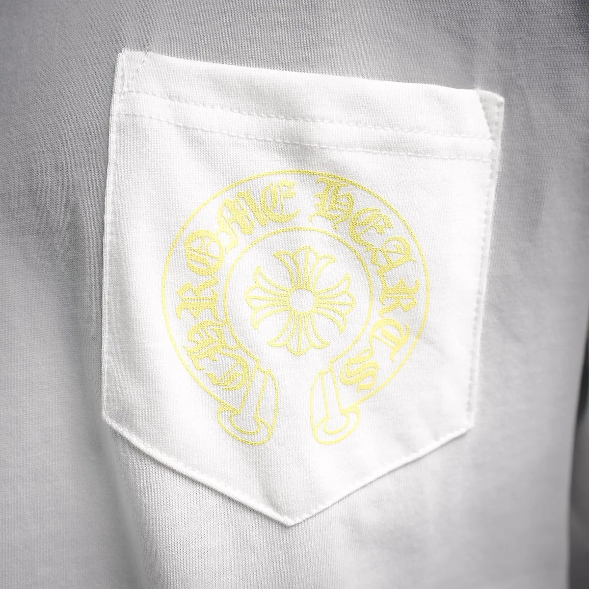 White T-shirt left chest pocket with yellow circular logo print