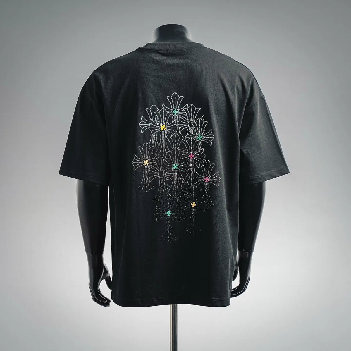 Black short-sleeve T-shirt with large rhinestone cross and floral fan design on back