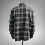 Long-sleeve button-up shirt, dark plaid with floral pattern, back view