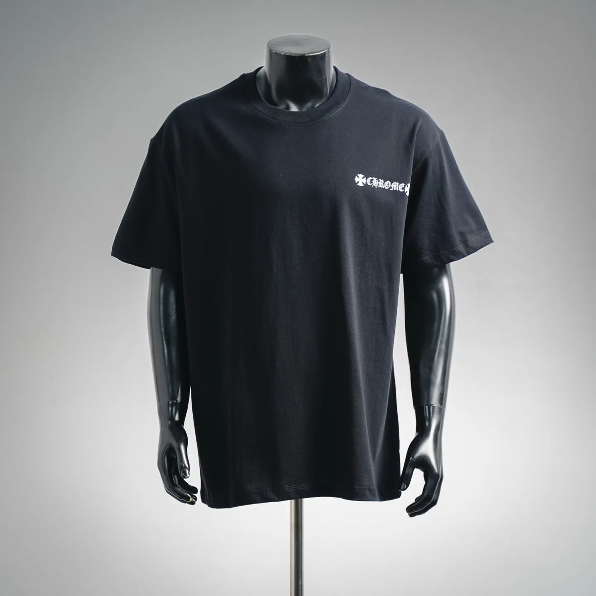 Black short-sleeve T-shirt with small white Chrome Hearts-style chest graphic