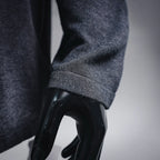 Long-sleeve cuff and sleeve hem on dark raglan T-shirt