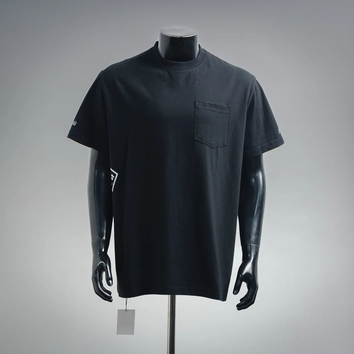 Black crew-neck short-sleeve T-shirt with chest pocket detail