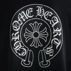 Black long-sleeve T-shirt with large white circular back graphic logo