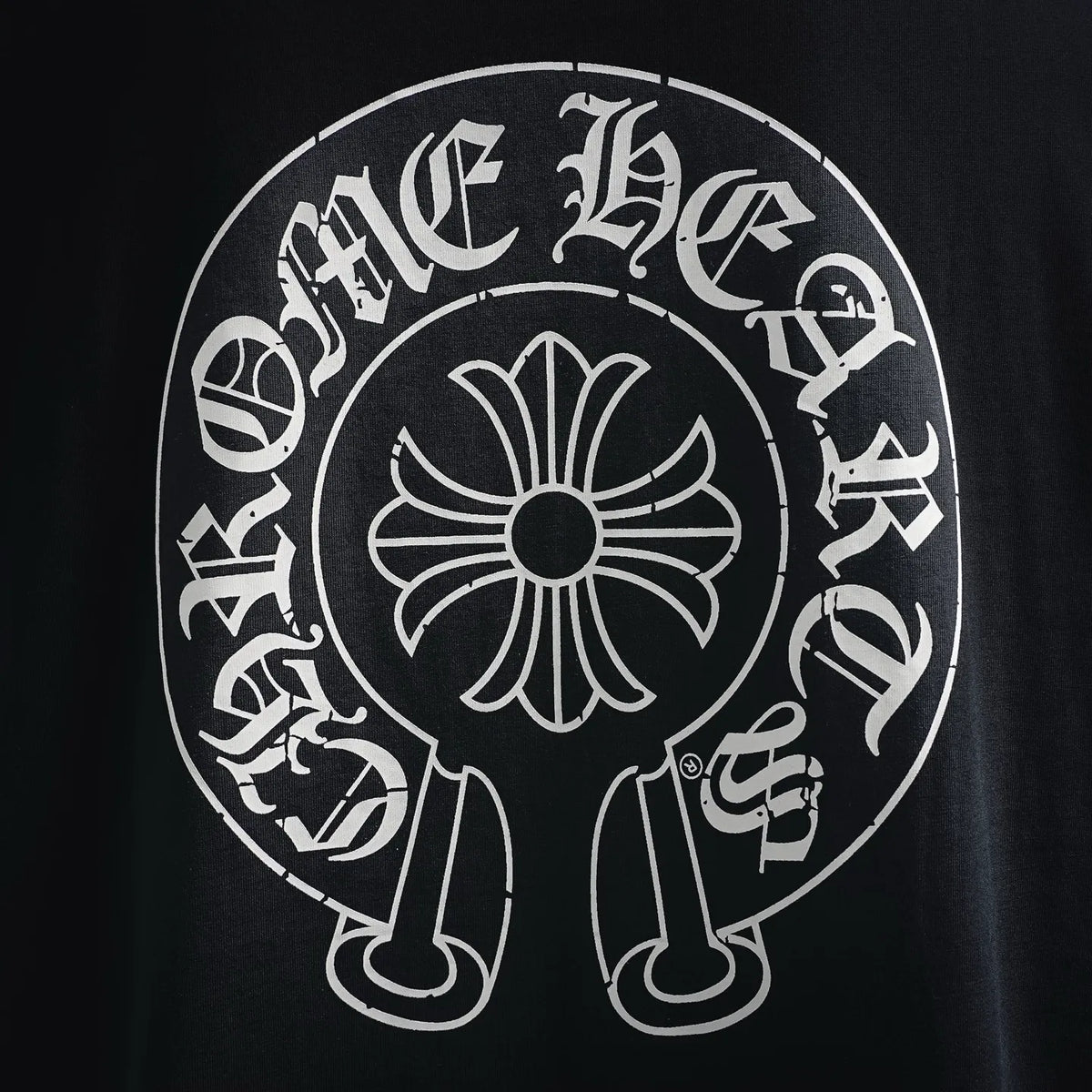 Black long-sleeve T-shirt with large white circular back graphic logo