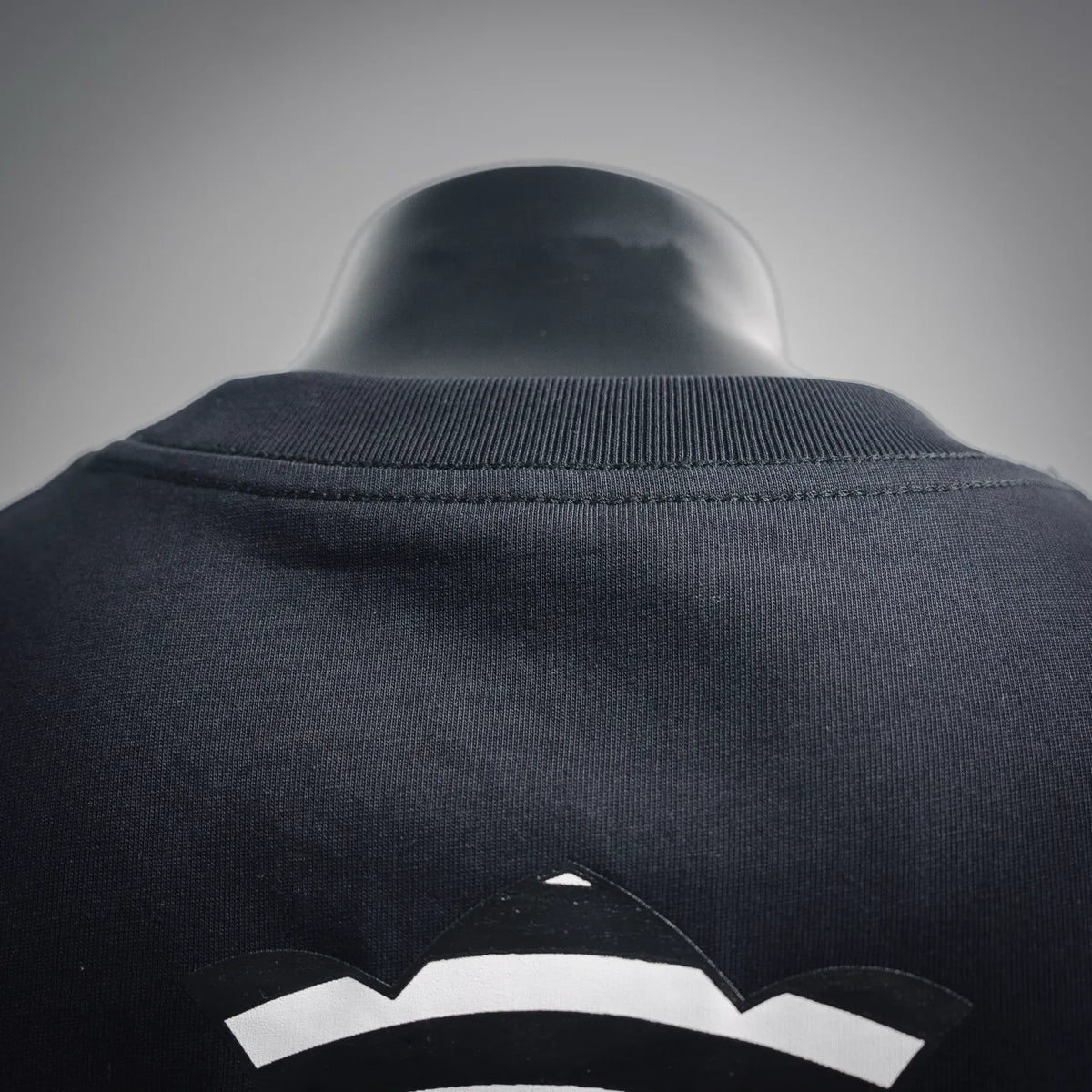 Dark navy T-shirt collar with ribbed crew neckline and neat back stitching