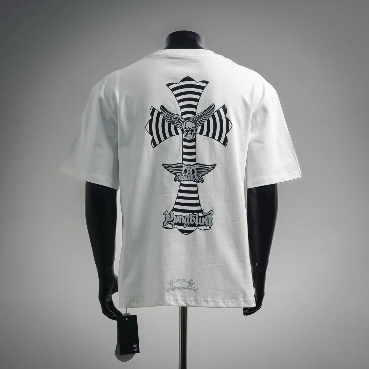 White short-sleeve T-shirt with large back cross graphic in black and striped detail