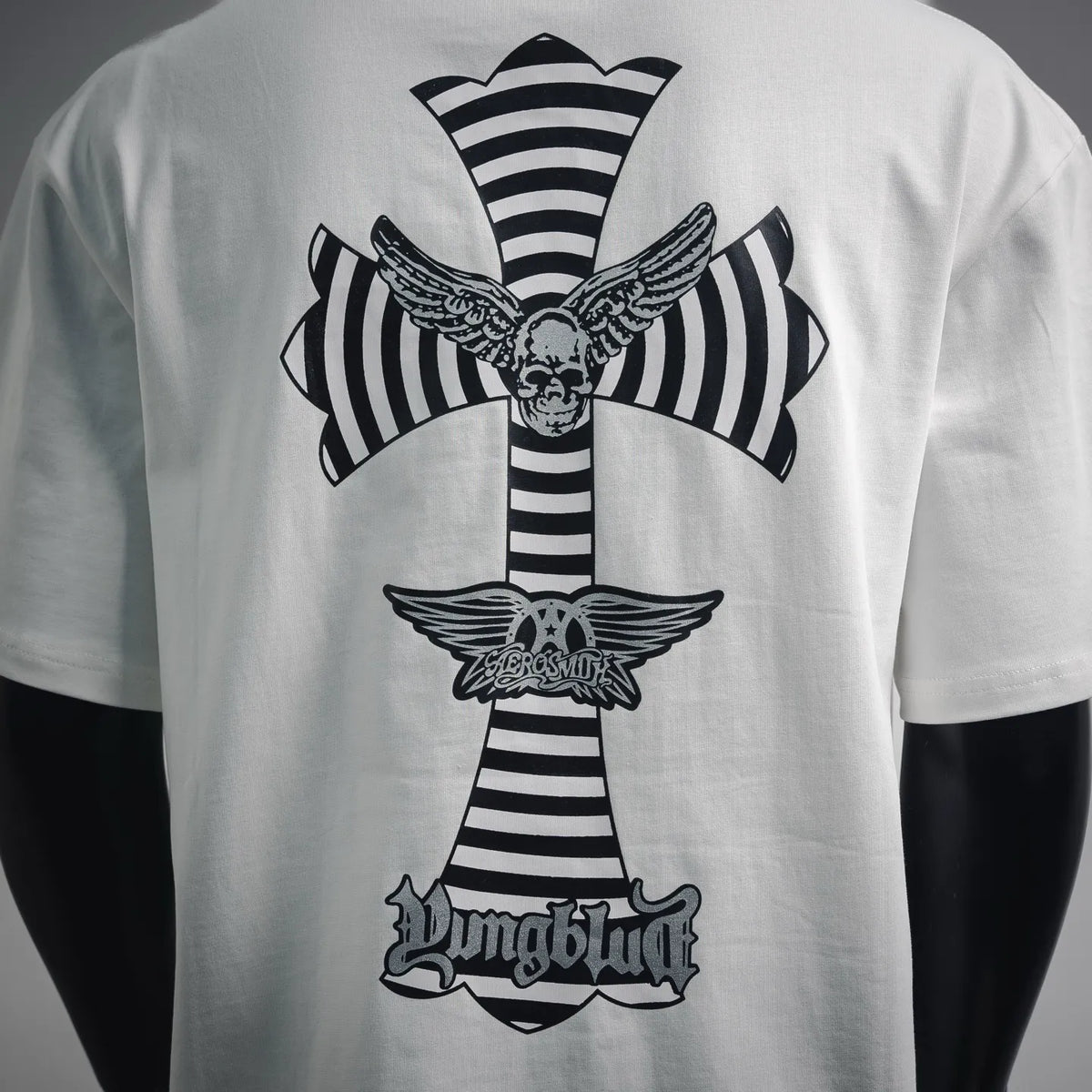 White short-sleeve T-shirt with centered back cross graphic and striped ribbon