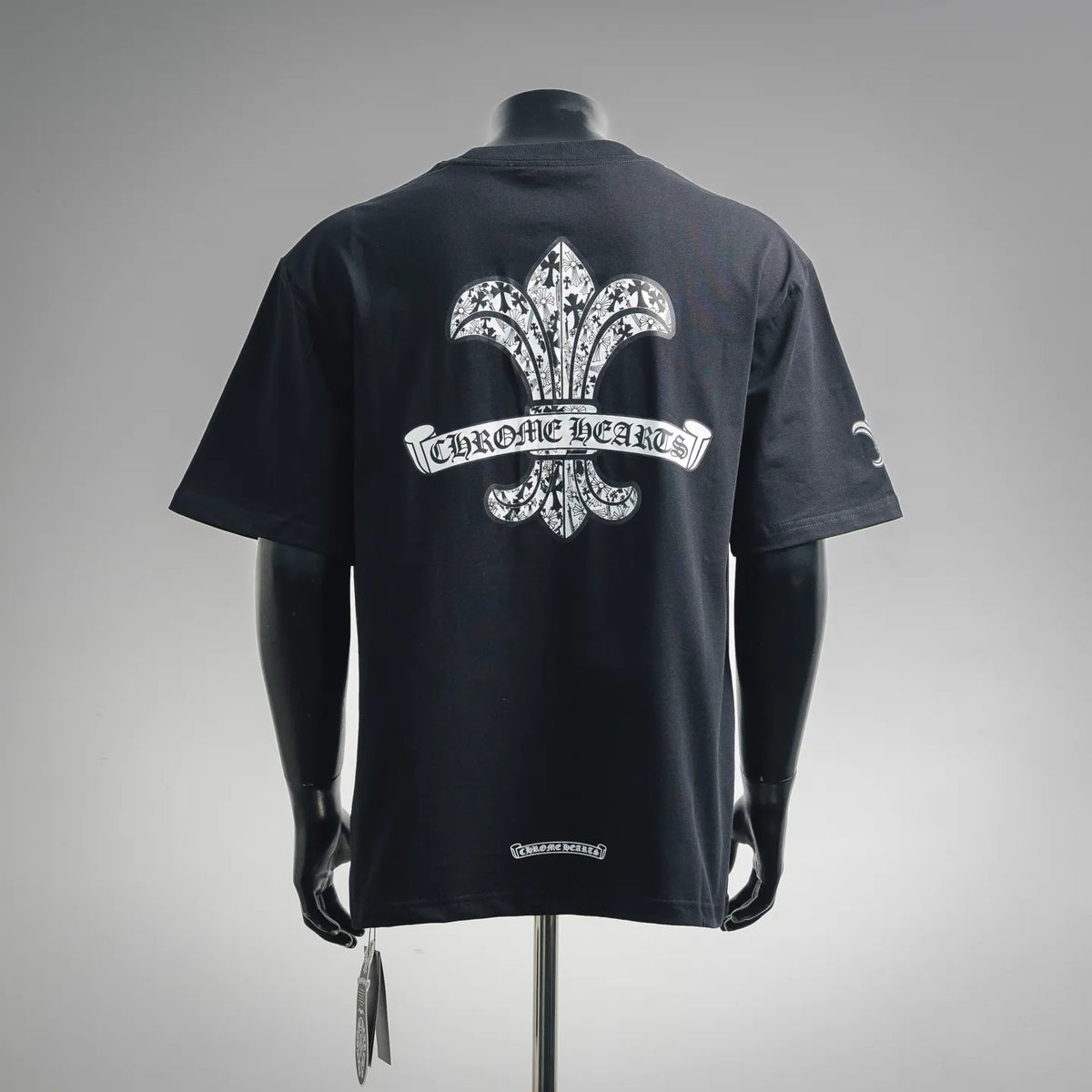 Black crew-neck short-sleeve T-shirt with large fleur-de-lis back graphic