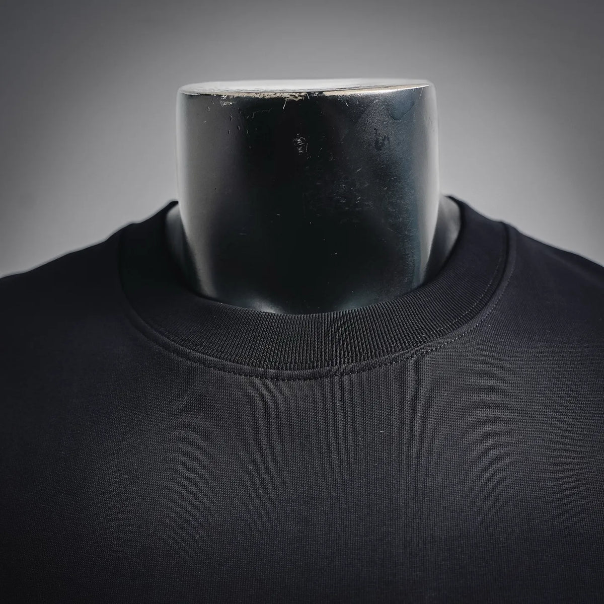 Dark crewneck T-shirt with ribbed neckline