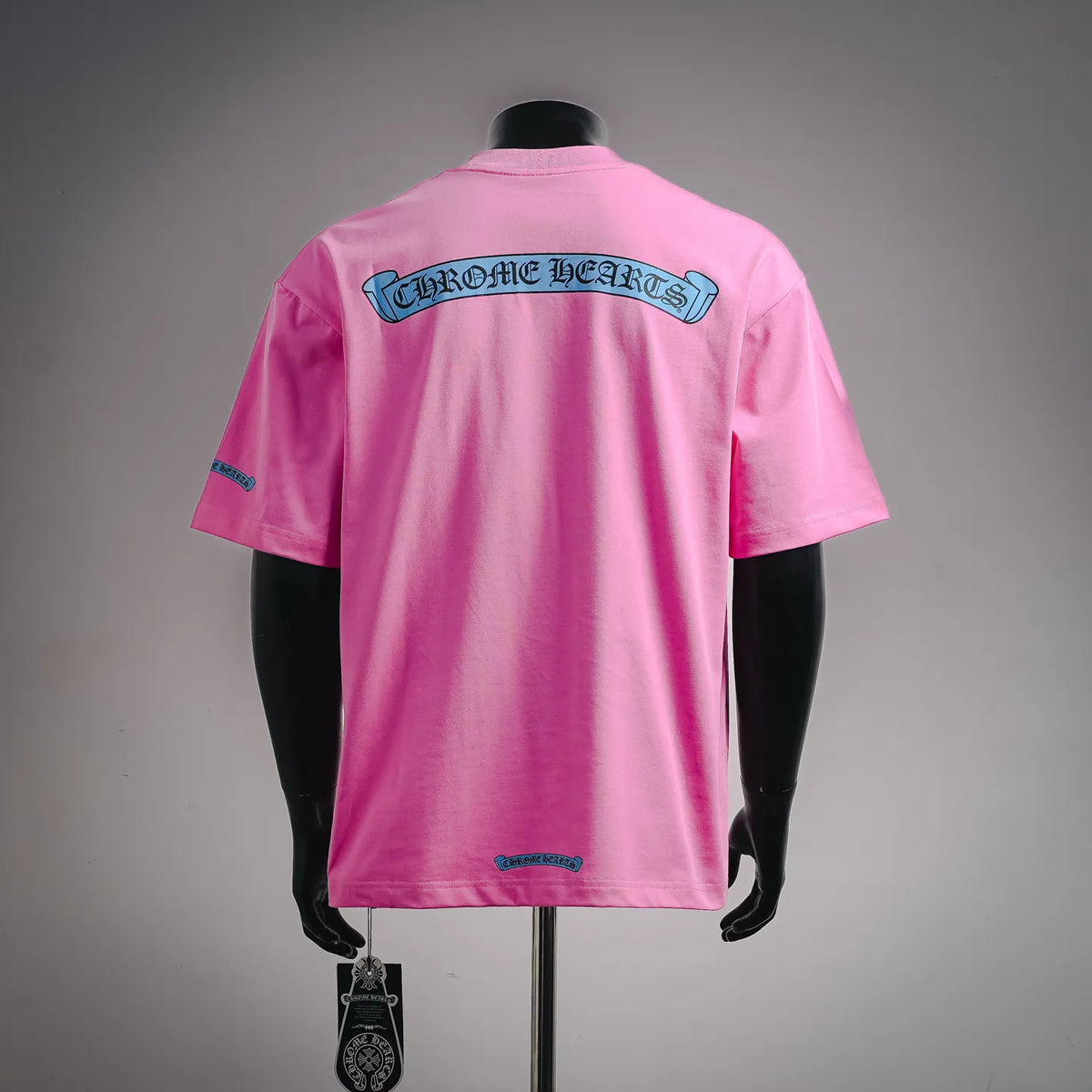 Pink short-sleeve T-shirt with large back graphic and small front chest logo