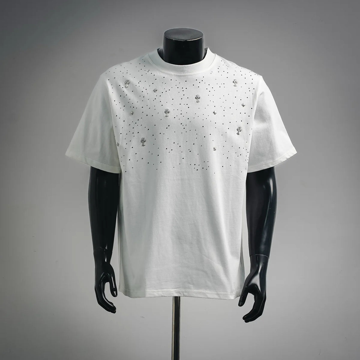 White short-sleeve crew-neck T-shirt with scattered rhinestone cross charms on front