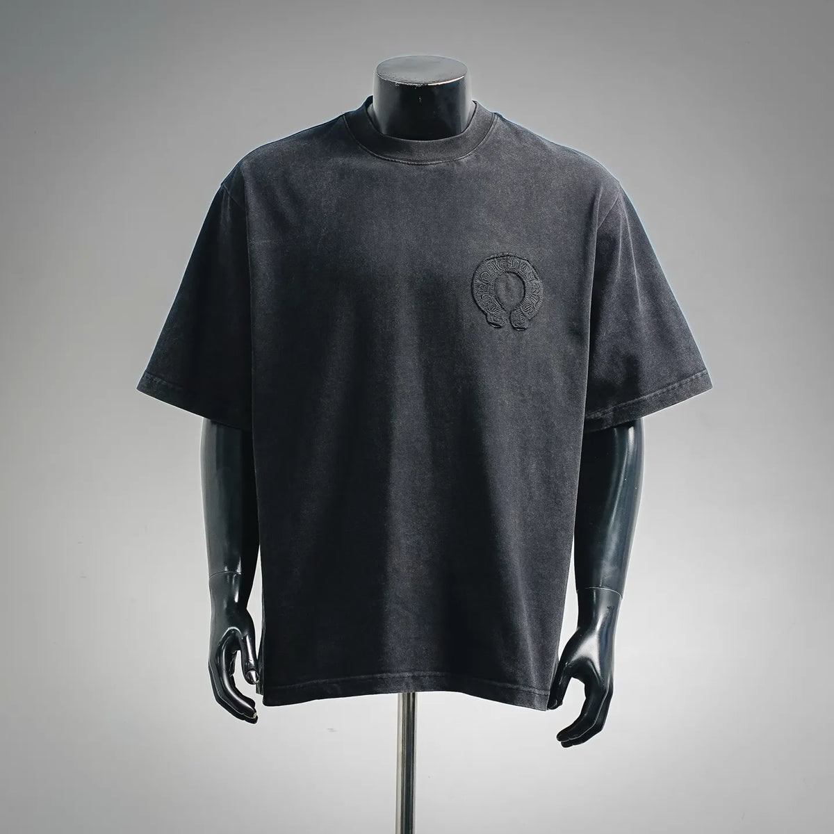 Black short-sleeve T-shirt with small front logo embroidery