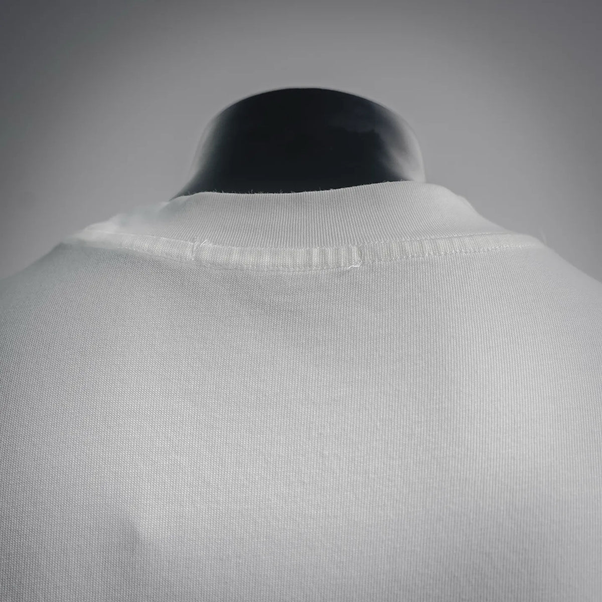 White short-sleeve T-shirt neckline with ribbed crew collar