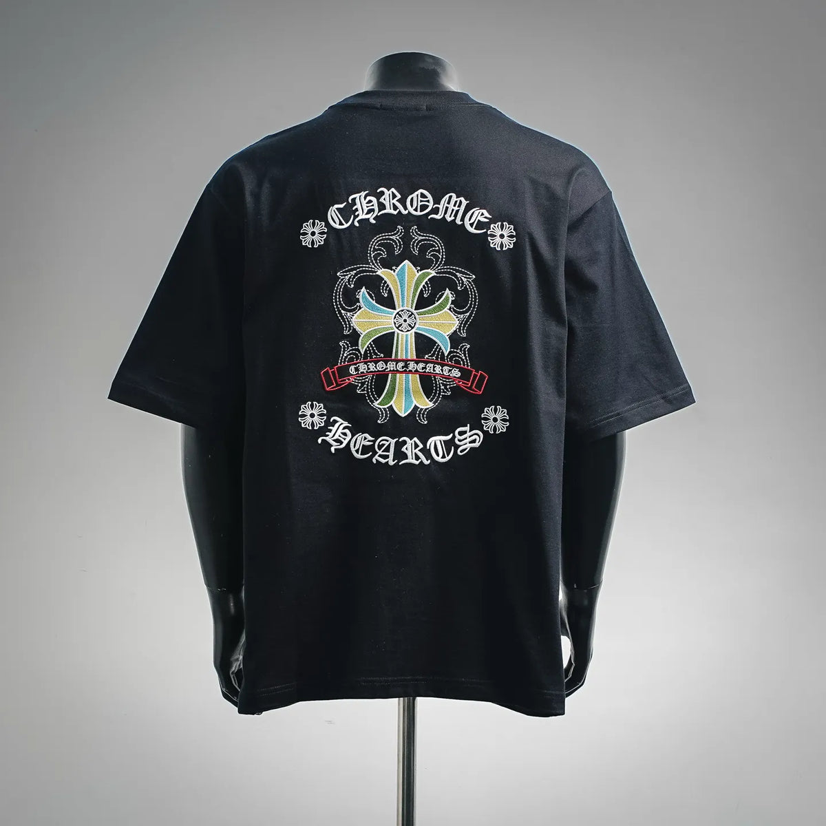 Black short-sleeve T-shirt with large back floral cross graphic